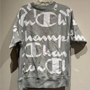 Champion large all over print logo short sleeve sweatshirt in size large